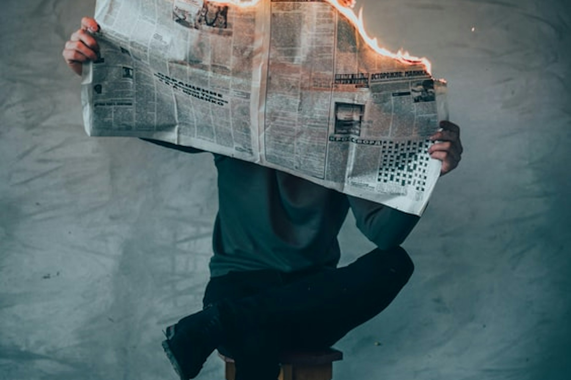 burning newspaper