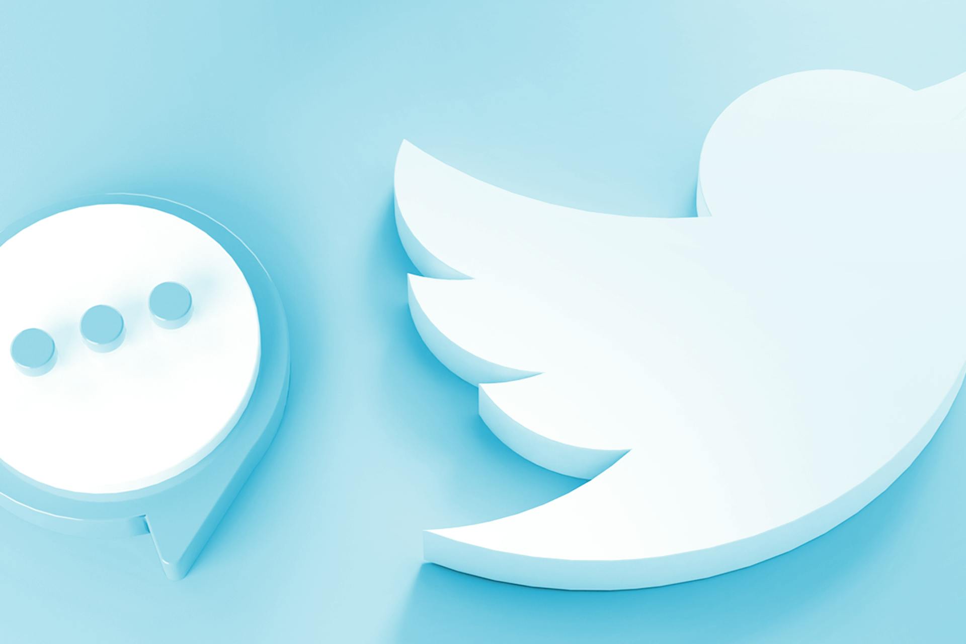 Image of large Twitter logo bird next to a speech bubble. Using Twitter for customer service blog post