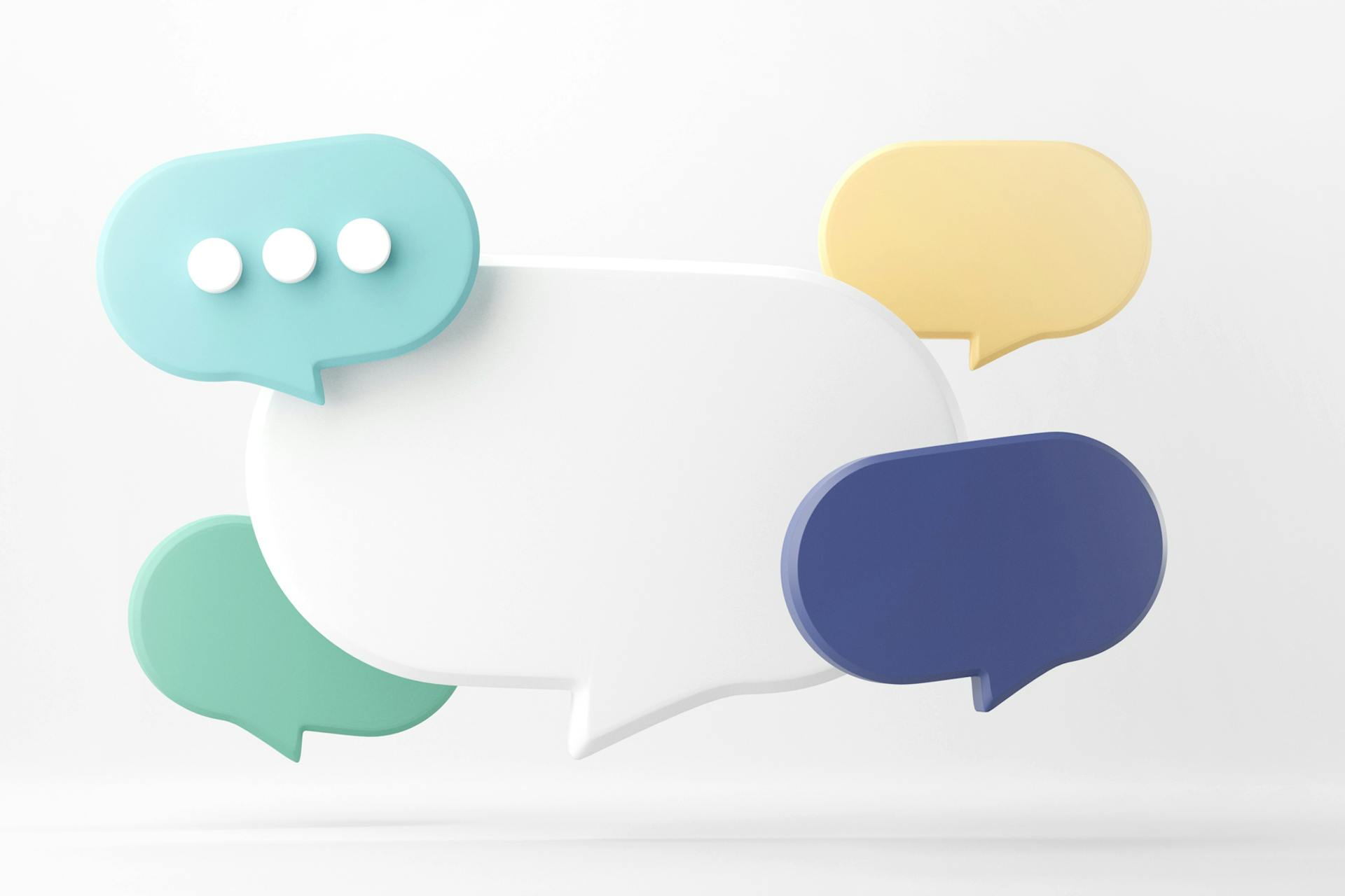 Image showing speech bubble surrounded by smaller speech bubbles in different colors. Blog post detailing what employees should never share on social media