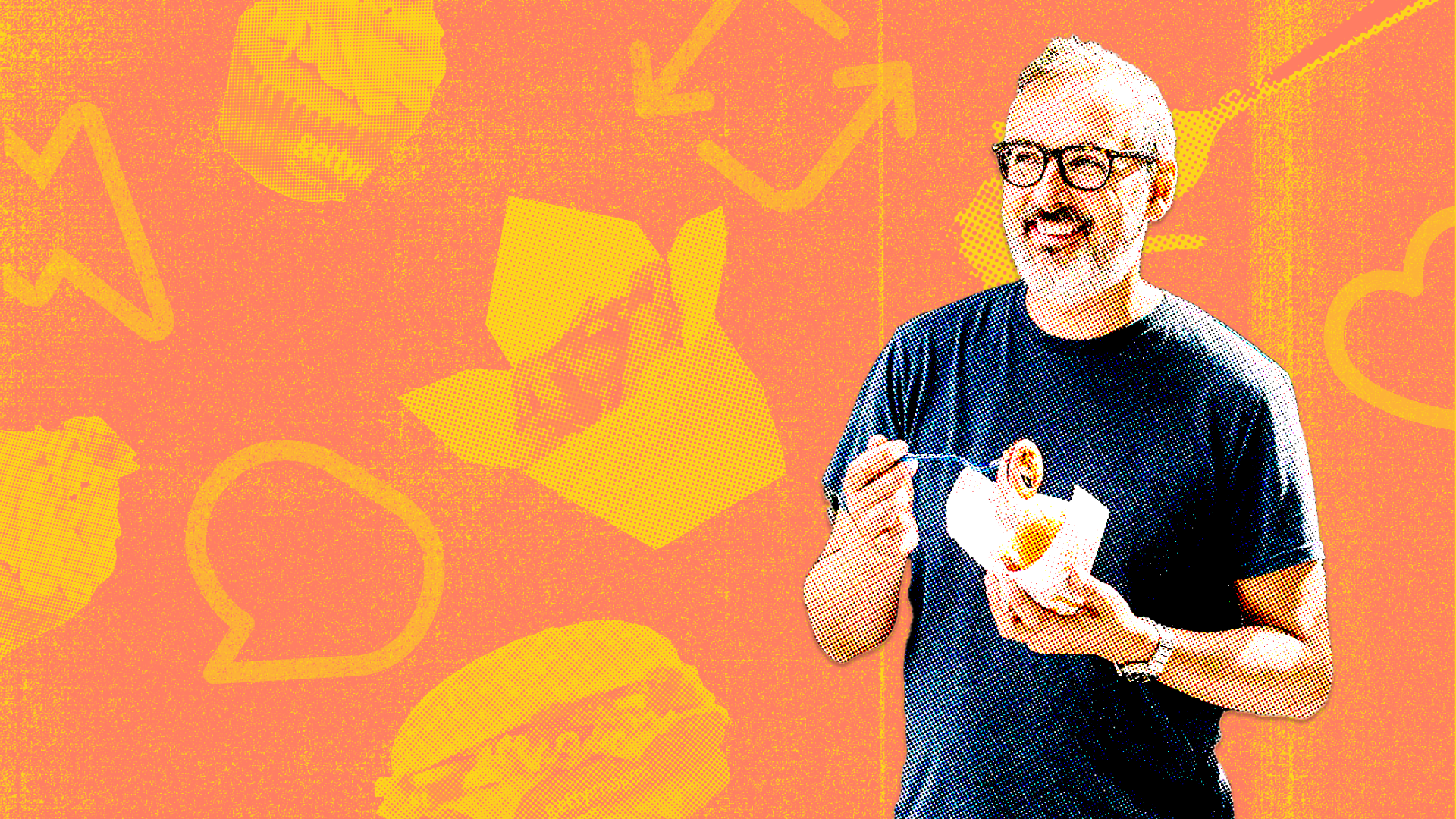 A man eating take out from a paper cone against a bright orange background.