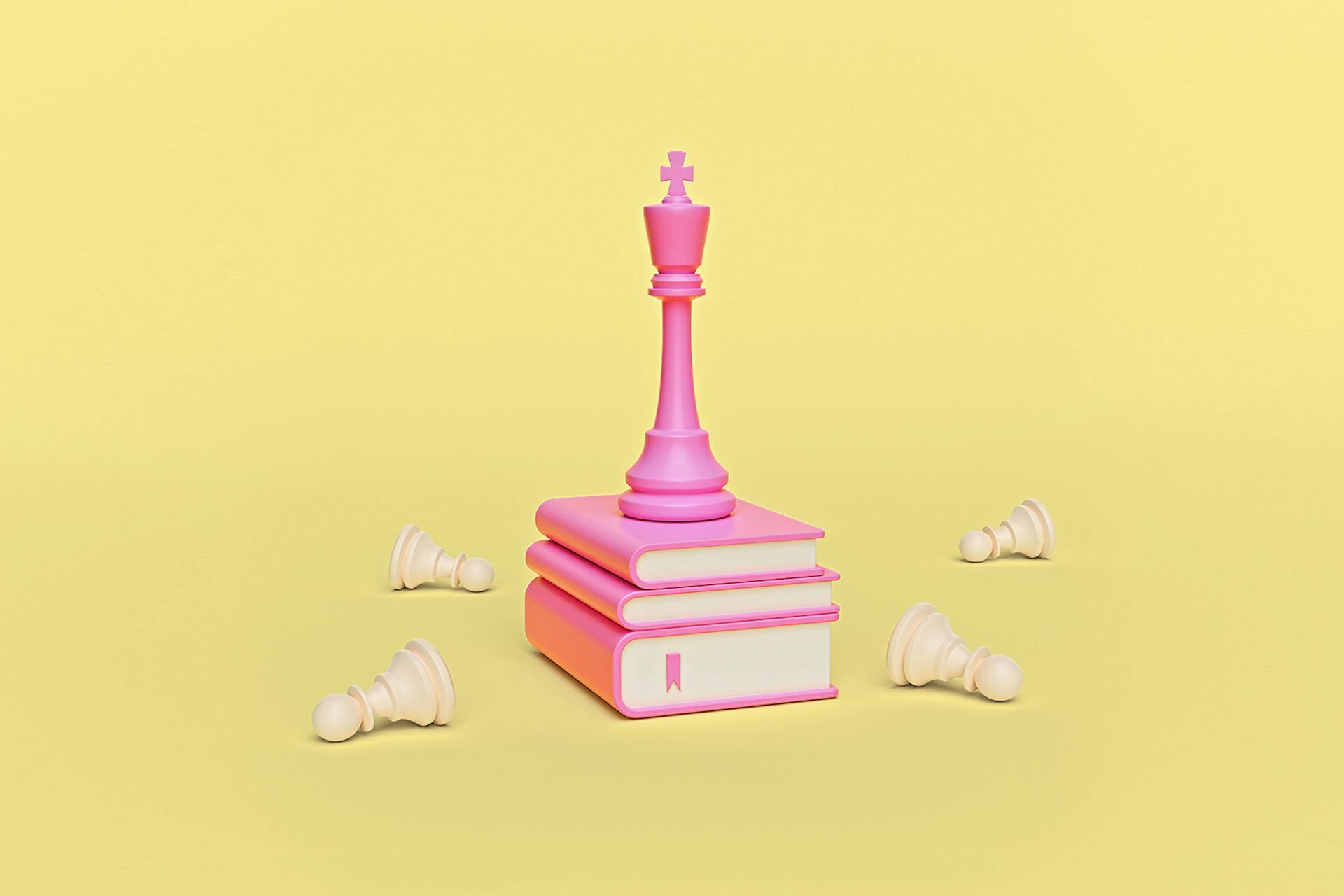 This blog is a guide on how to come out on top when it comes to product branding, so this image of a pink chess piece sat atop a stack of books with fallen pawn chess pieces around the books demonstrates the winning strategy one can gain from reading this post.