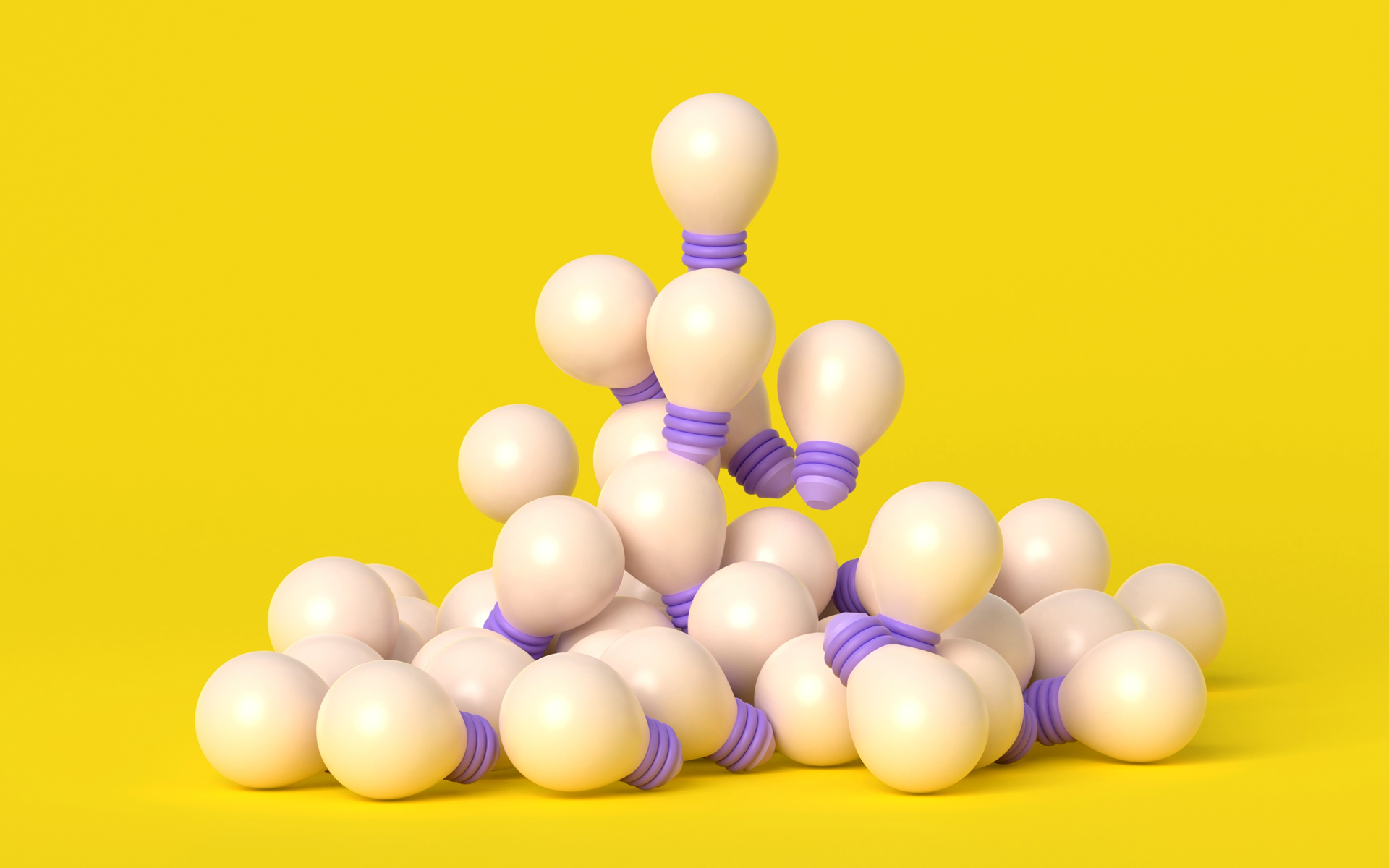 A pile of lightbulbs against a yellow background in this image for a blog about Meltwater's Devopsicon unconference.