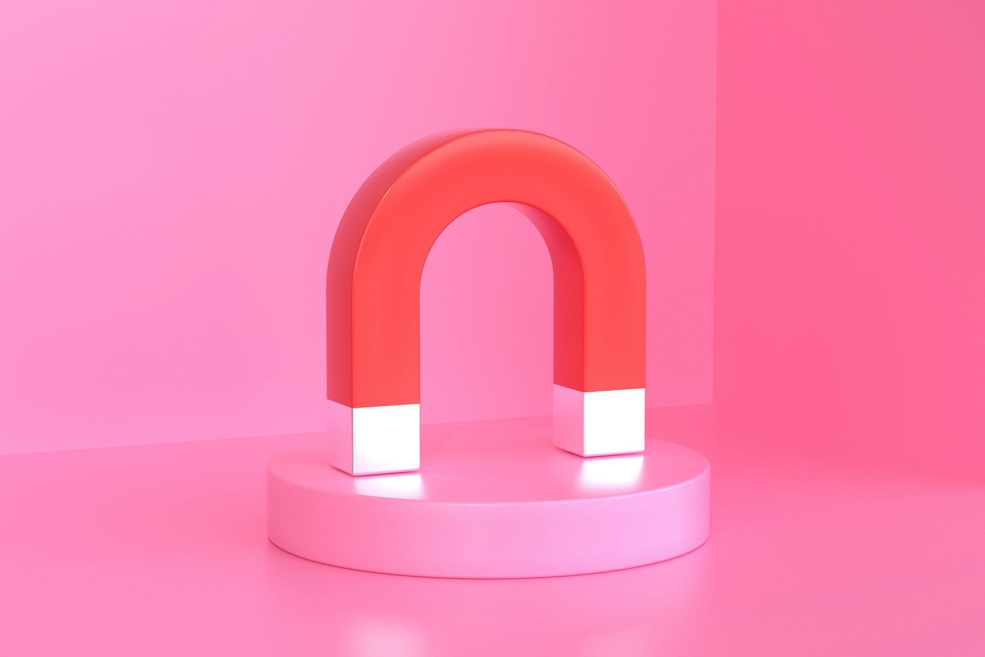 A pink magnet on a pink background