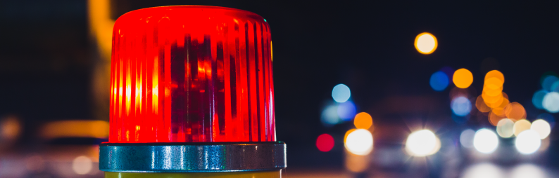 Image of red flashing police car light