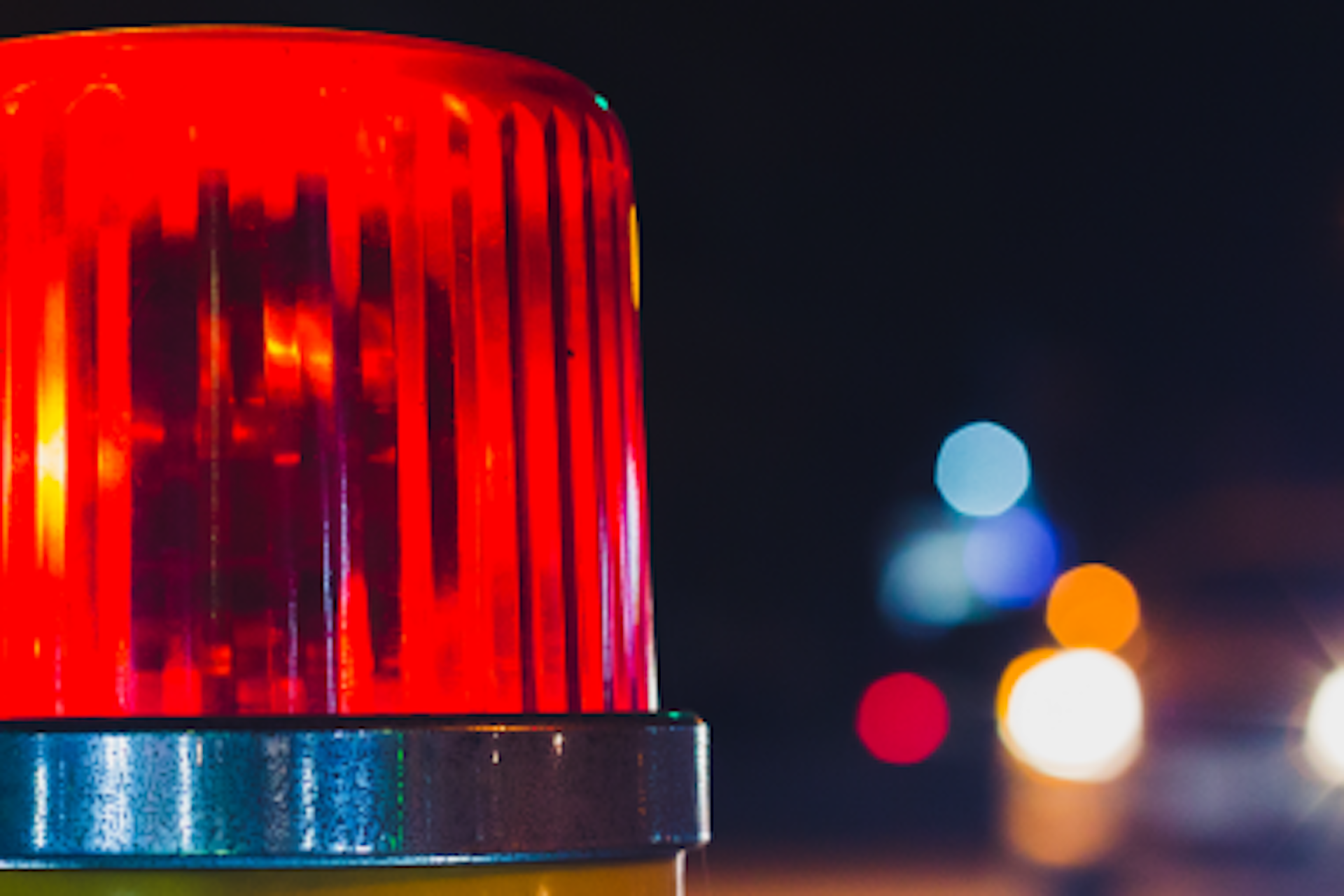 Image of red flashing police car light