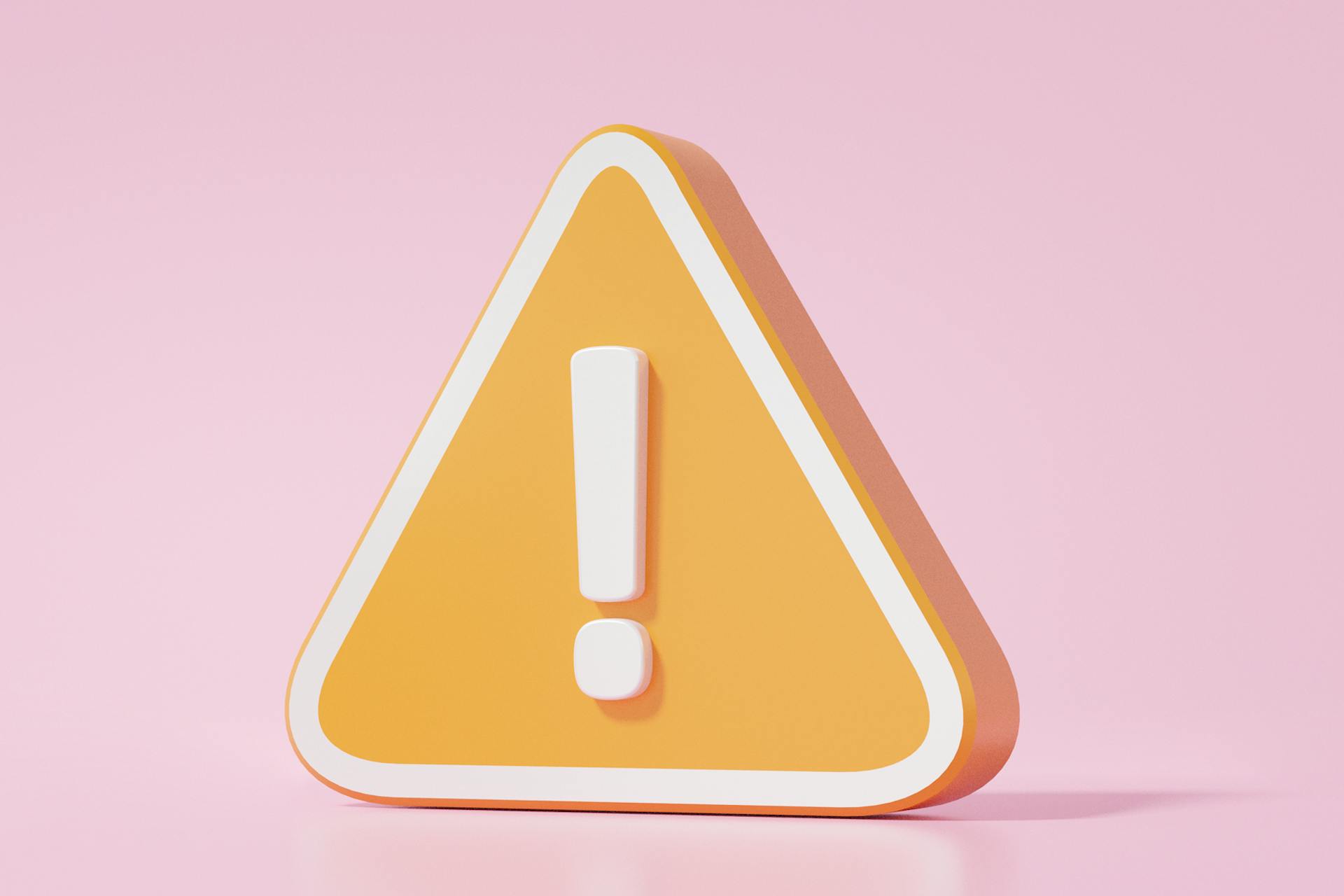 Yellow yield sign on a pink background. Don't make these common social media mistakes!