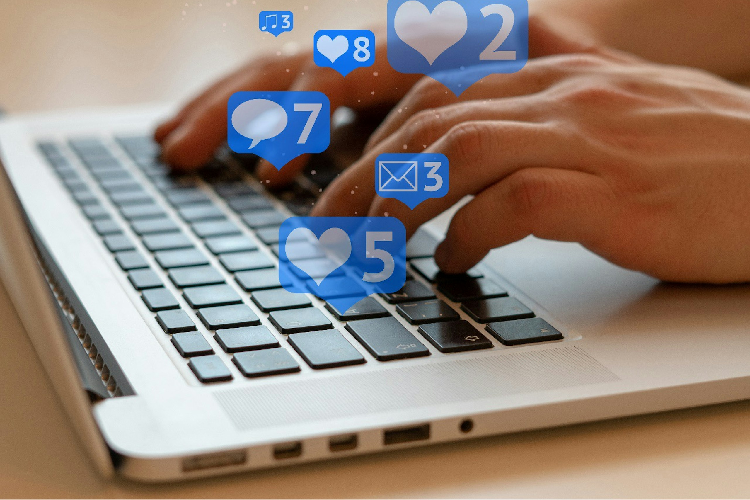 Typing on laptop