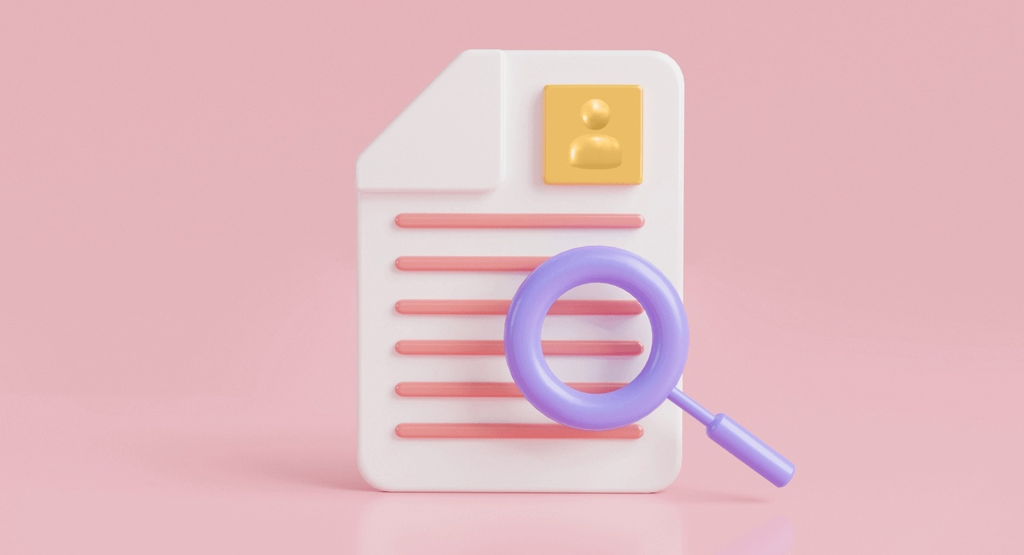 An illustration of a looking glass over the fine print of a document. 