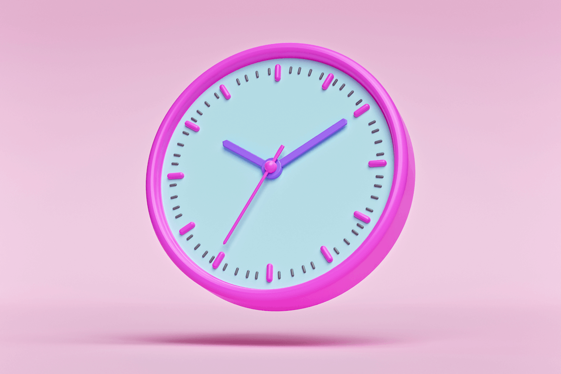Image of a bright pink clock with purple hands, on a light pink background. Best times to post on social media blog post