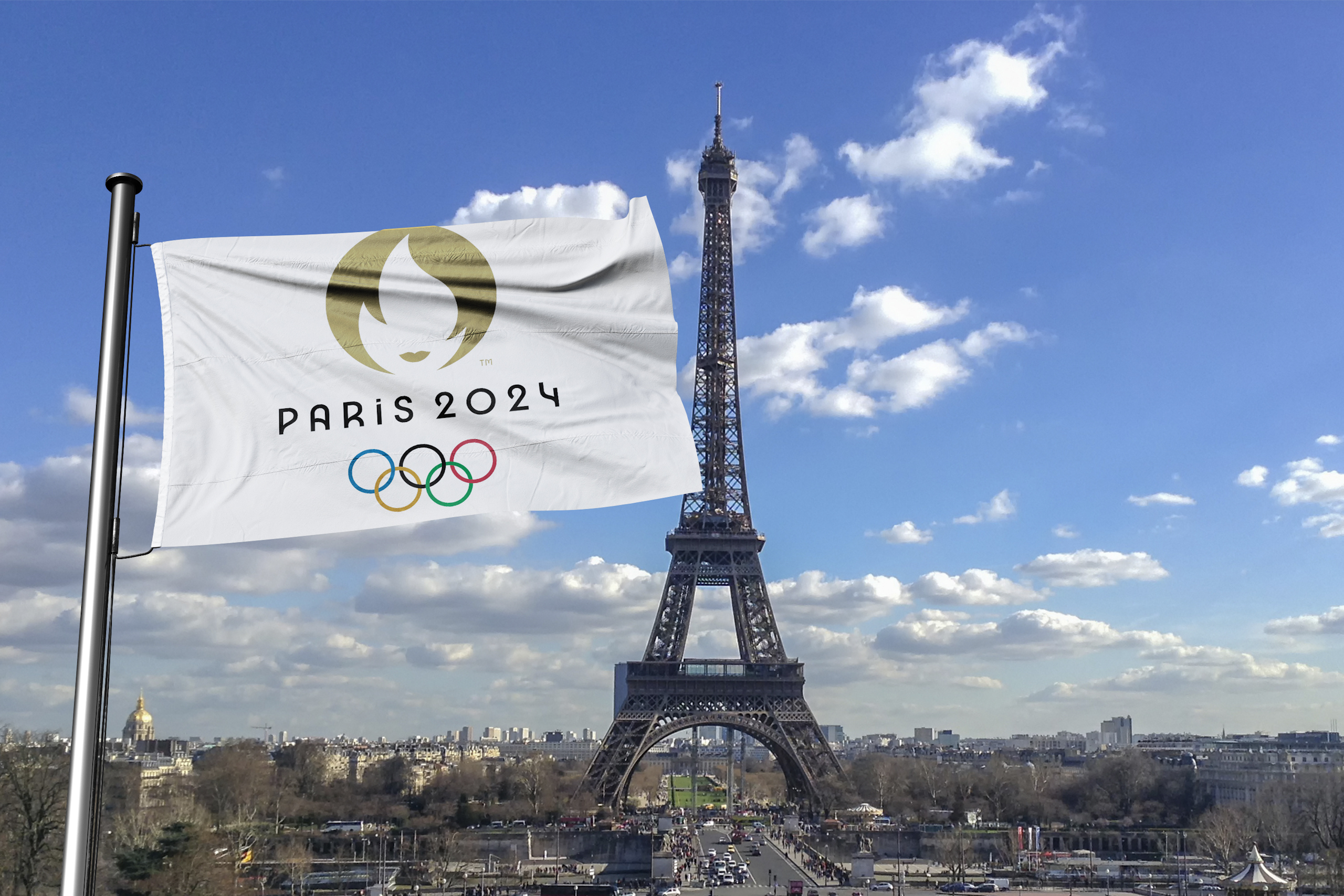 Une image de la Tour Eiffel et du drapeau des Jeux Olympiques.