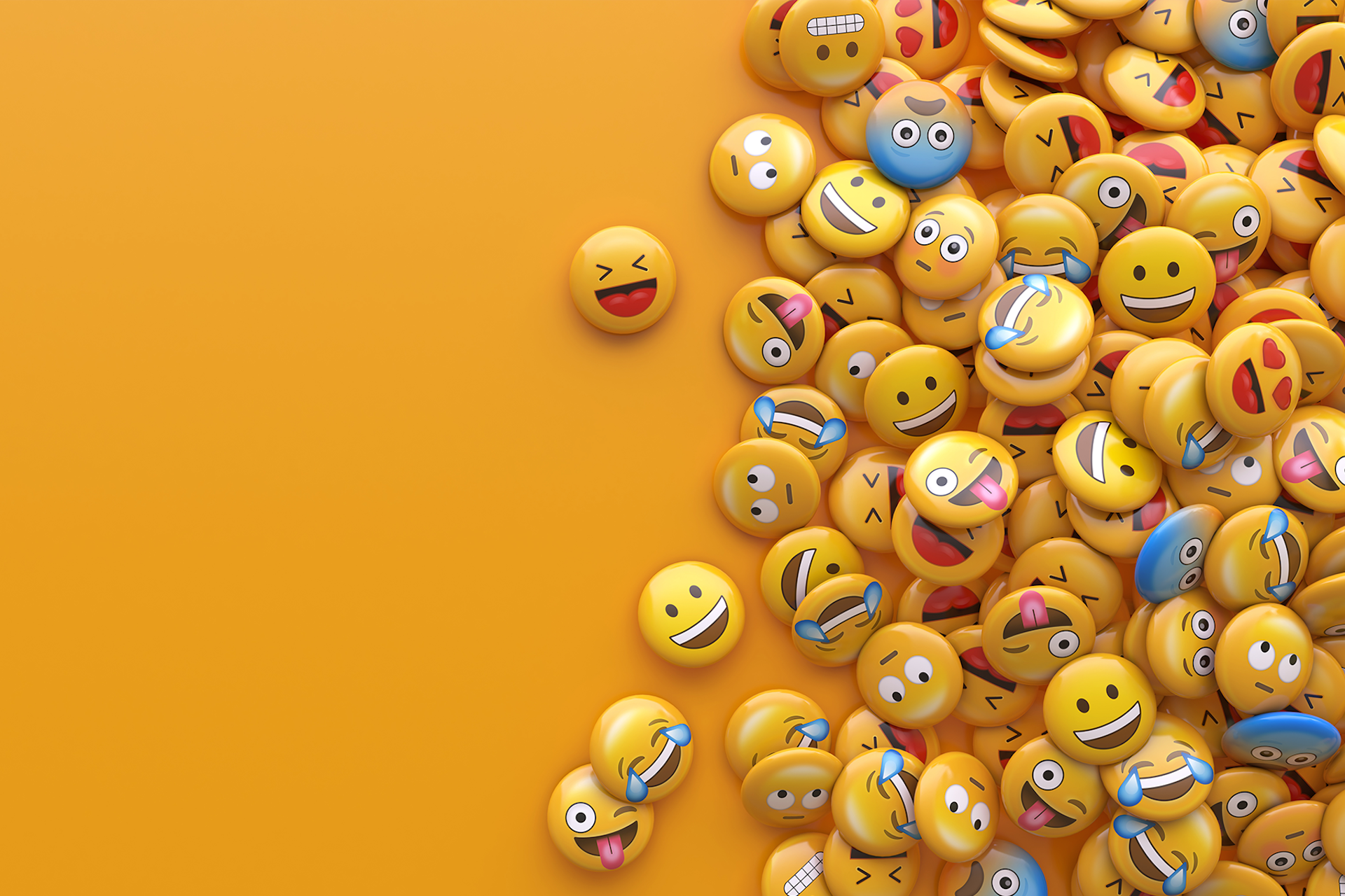 A pile of emojis on a plain yellow background.
