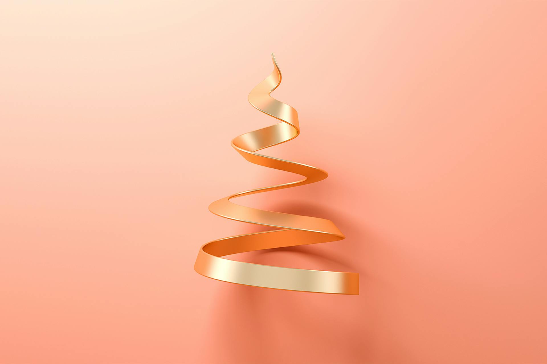 A gold, metal spiral pointing towards the sky set against a light orange backdrop. This image is being used for a blog on content marketing trends for 2022. 