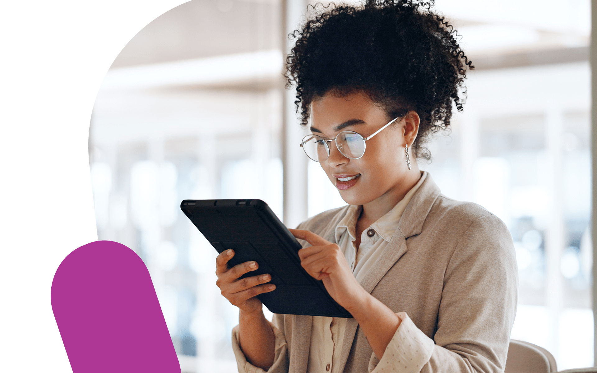 image of a female PR professional looking at a tablet for media relations campaign management