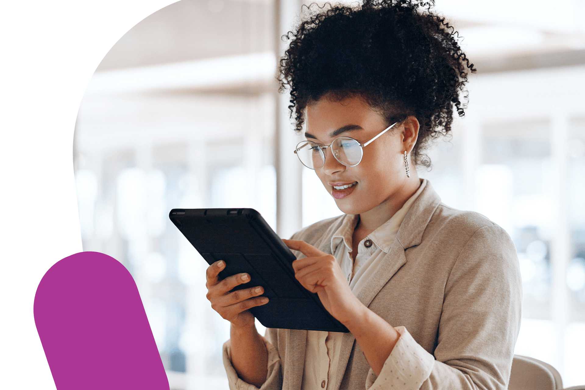 image of a female PR professional looking at a tablet for media relations campaign management