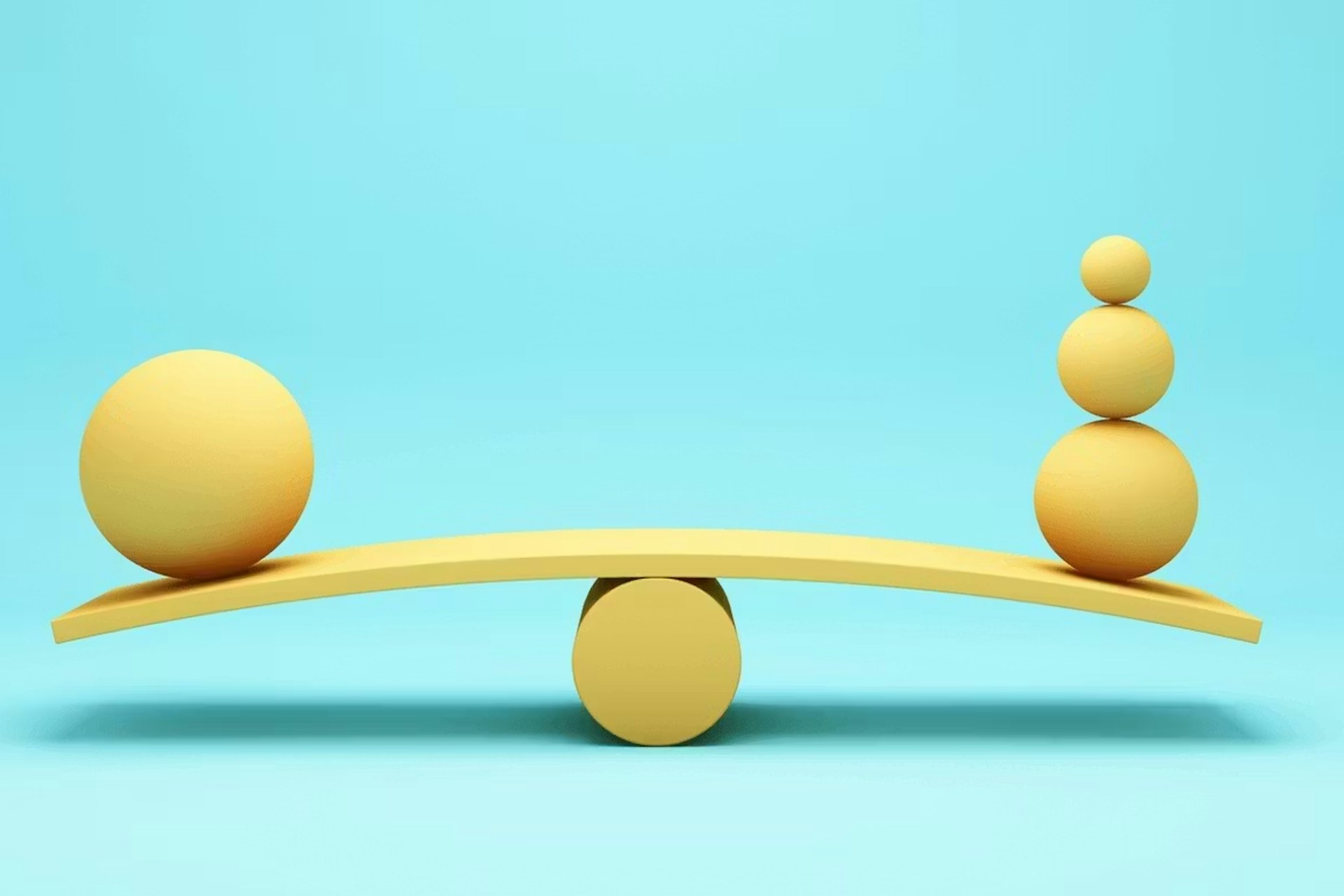 A seesaw with wooden blocks balanced on either side