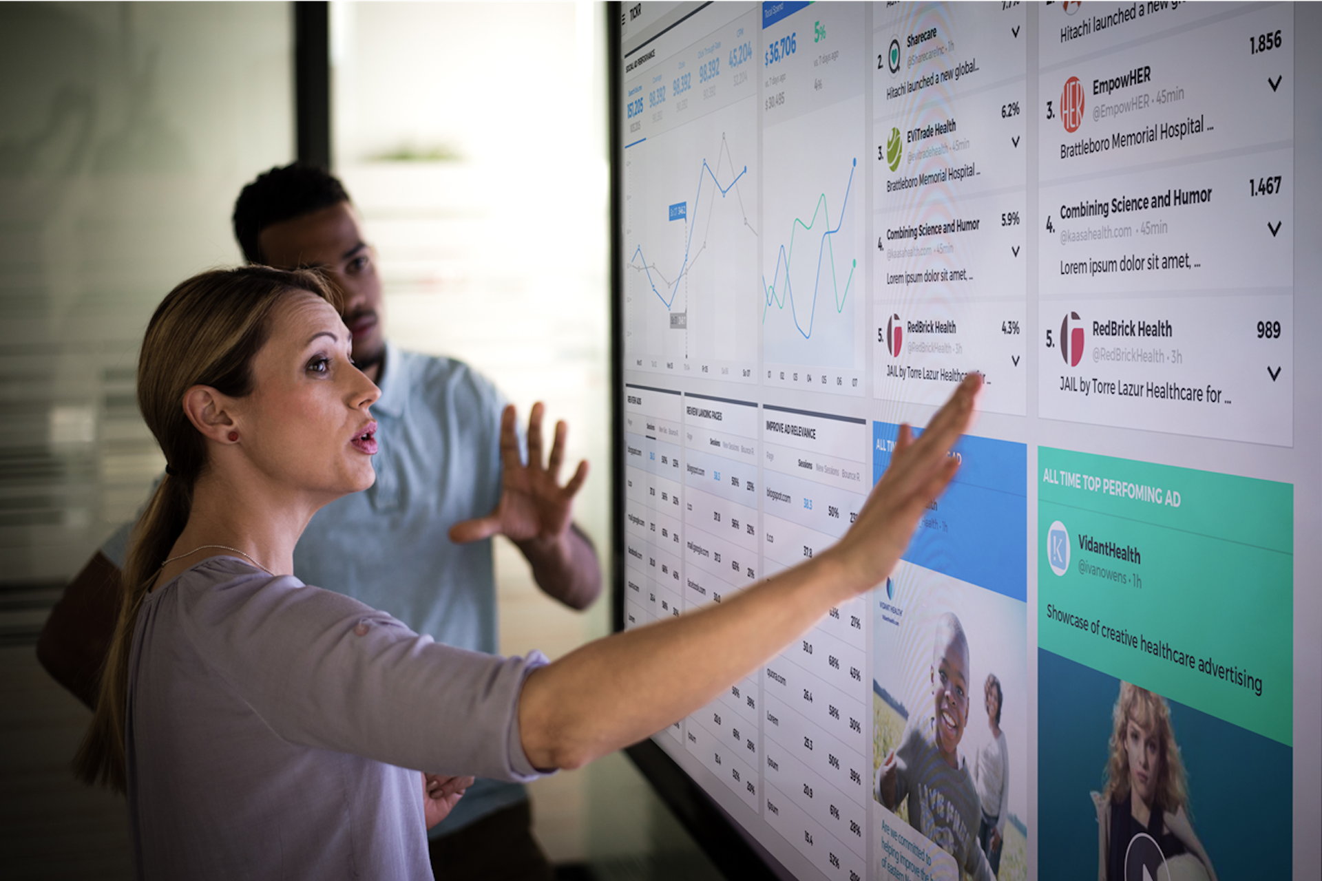 two people looking at a screen for data analysis