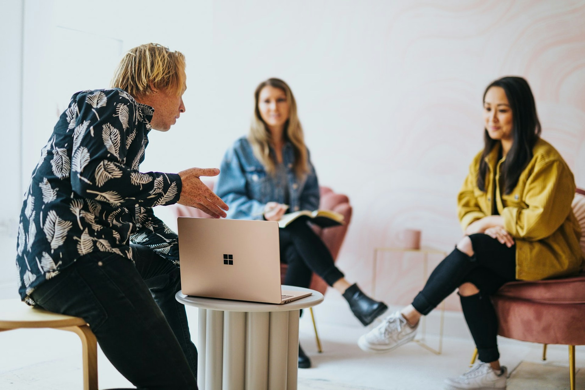 group looking at laptop screen
