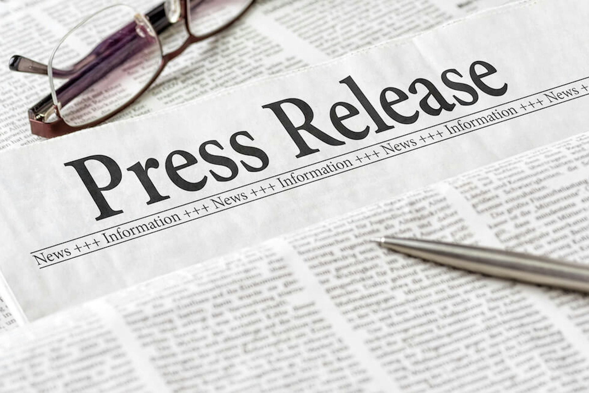Photo of a newspaper saying "Press Release"