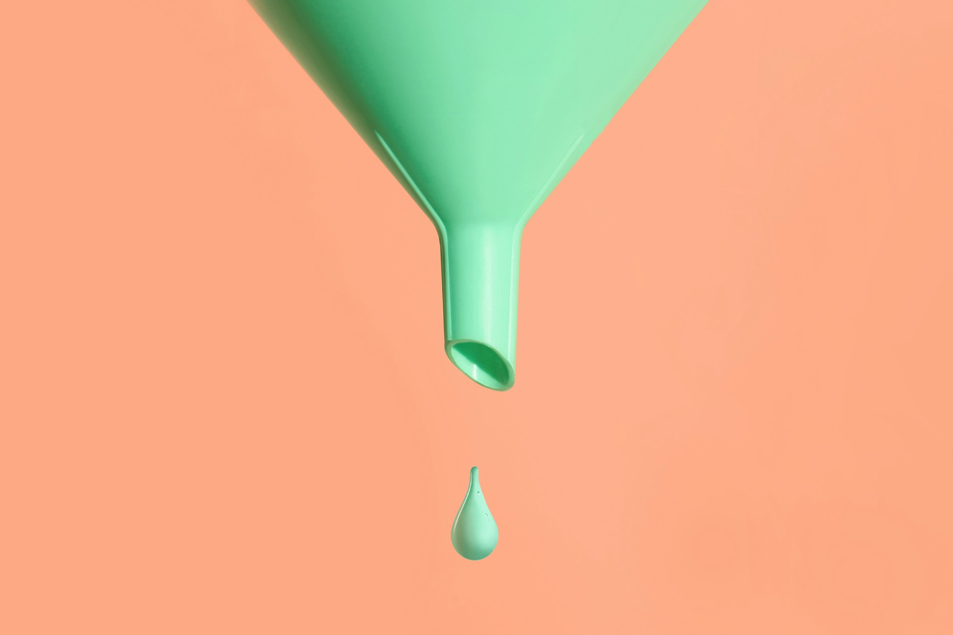 This blog on leveraging the marketing funnel explains how marketing teams can use various marketing tactics to bring people into their funnel and move them through the journey to the point of purchase. This image of a light green funnel with a drop of liquid falling from the end of it visually describes that customer journey. 