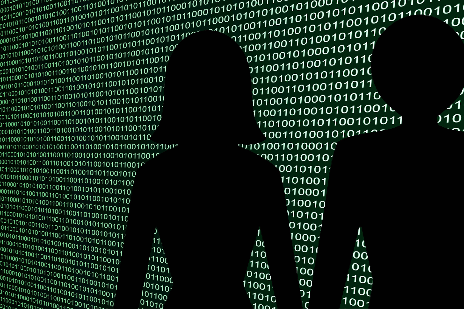 Deux ombres d'un homme et une femme sur fond de code
