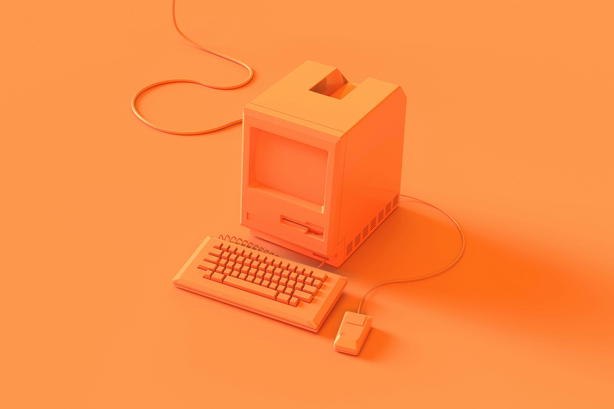 Un ordinateur rétro peint en orange sur un fond orange pour ce blog sur le Big Data pour les entreprises.