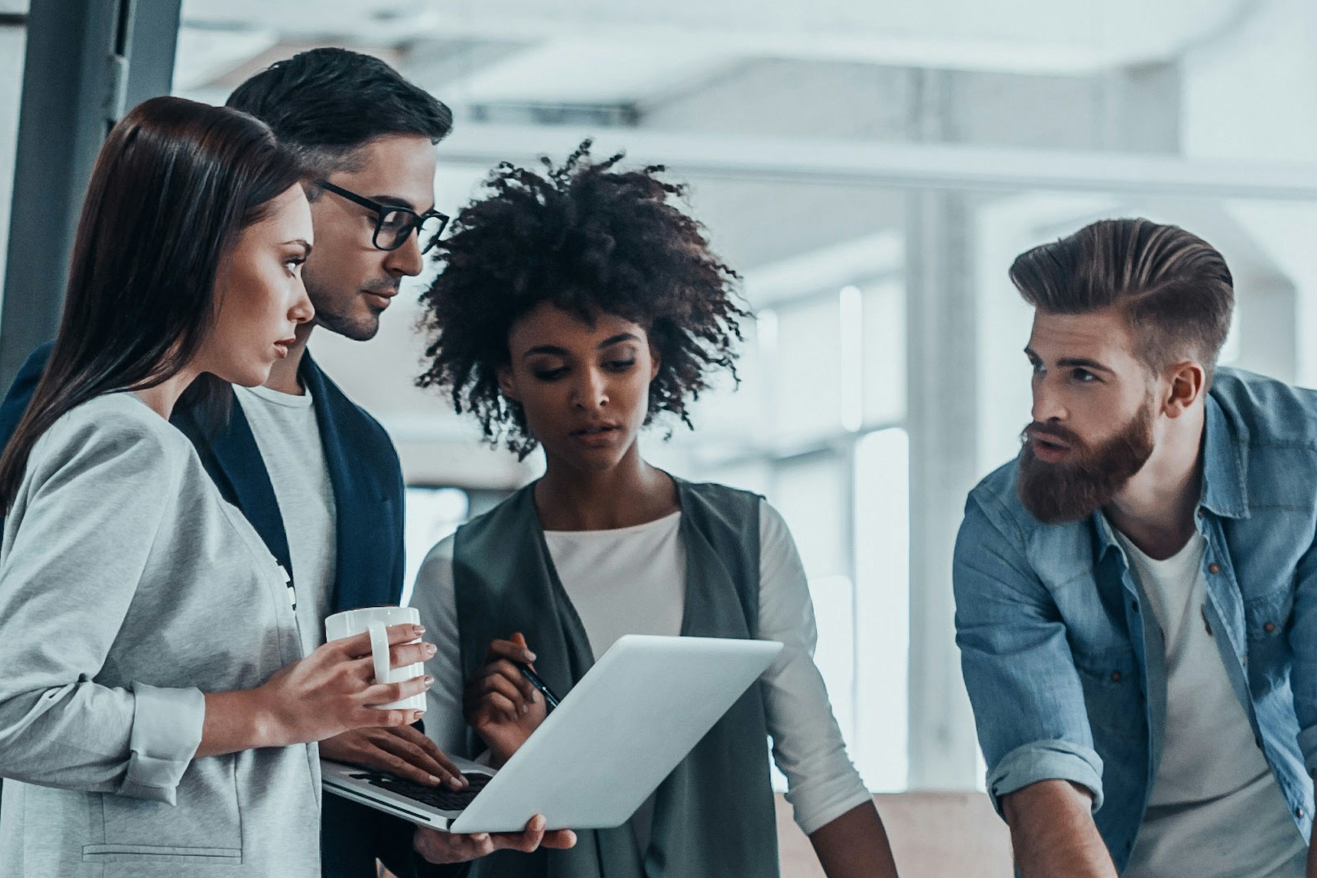 Photo of a team in an office working together