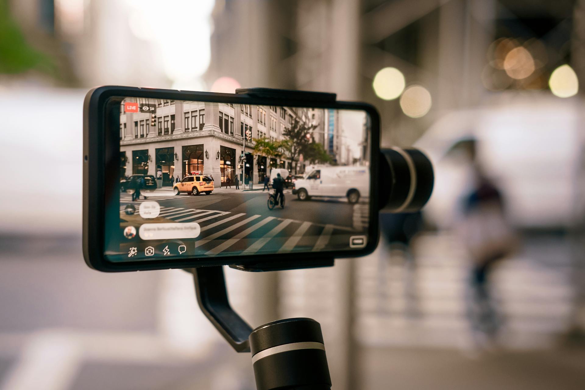 A live video of a street filmed through a mobile phone