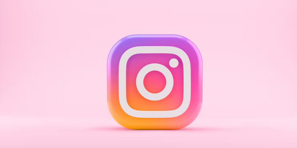 Logo Instagram sur fond rose