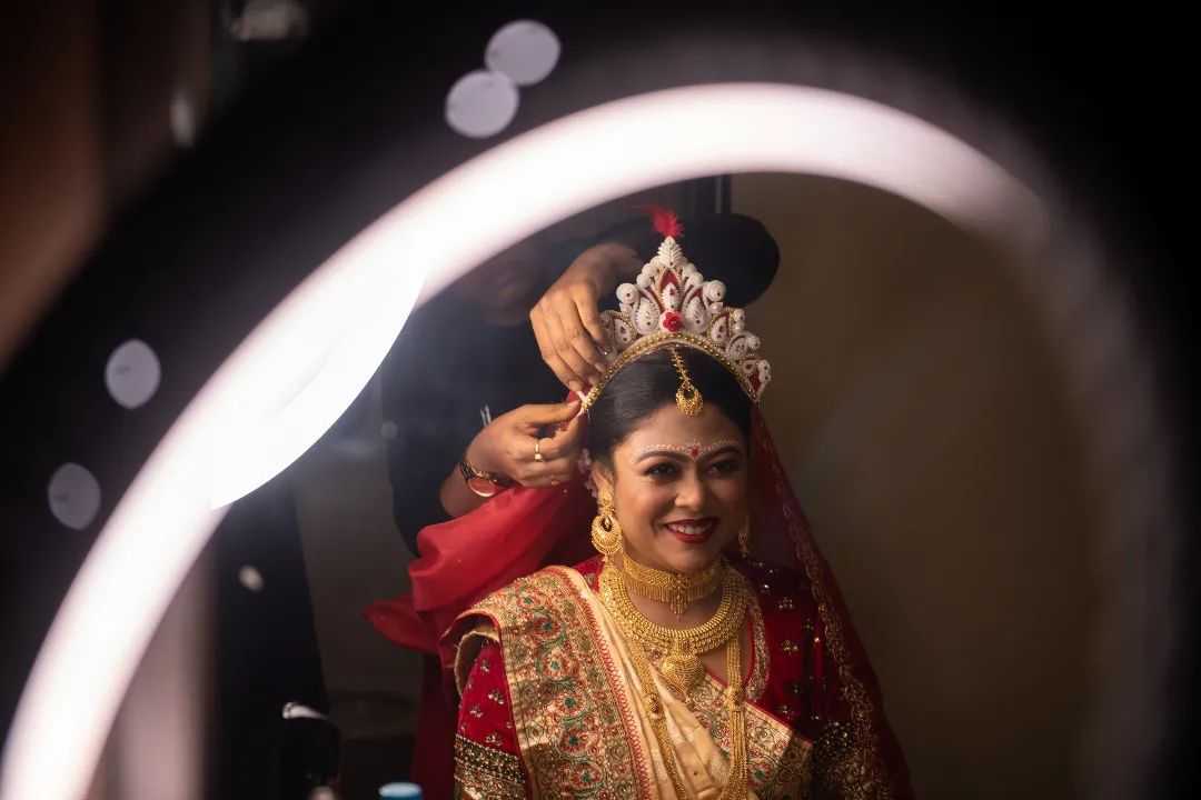 A distant shot of bride getting ready photo