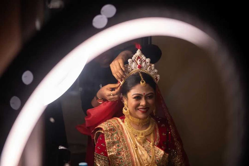 A distant shot of bride getting ready photo