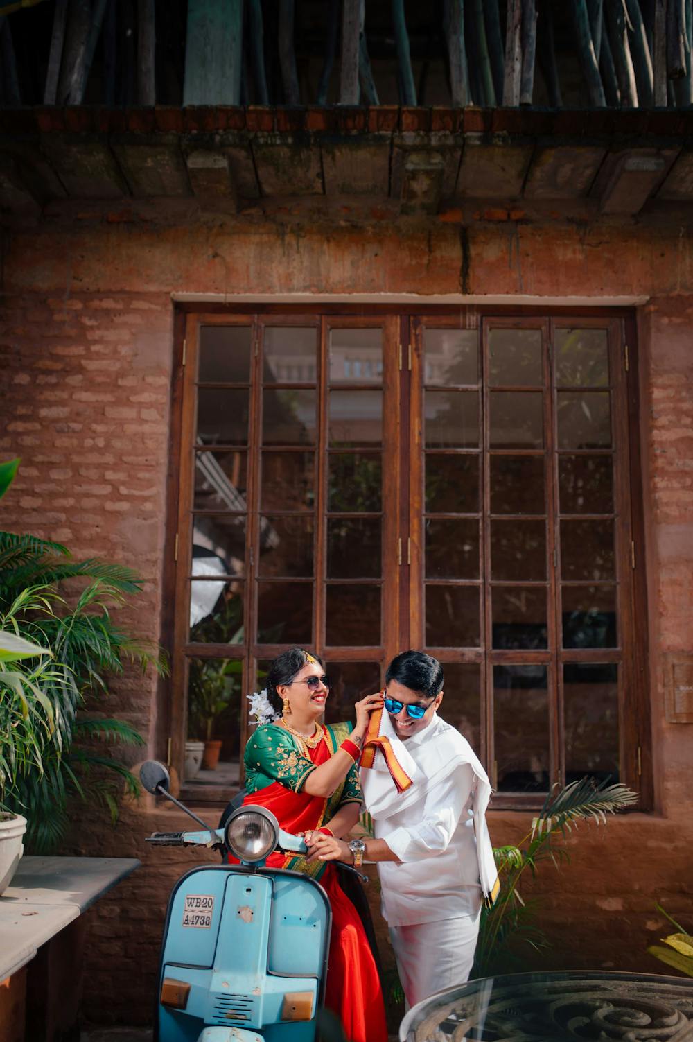 Pre-wedding photoshoot on a blue scooty pic