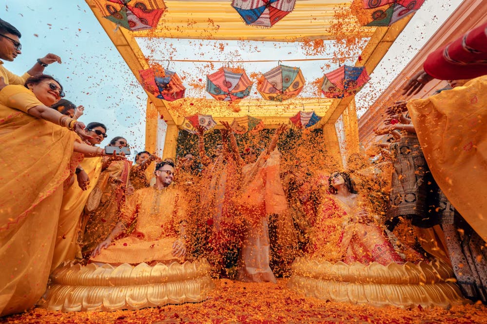 A fun Haldi ceremony photo of a wedding