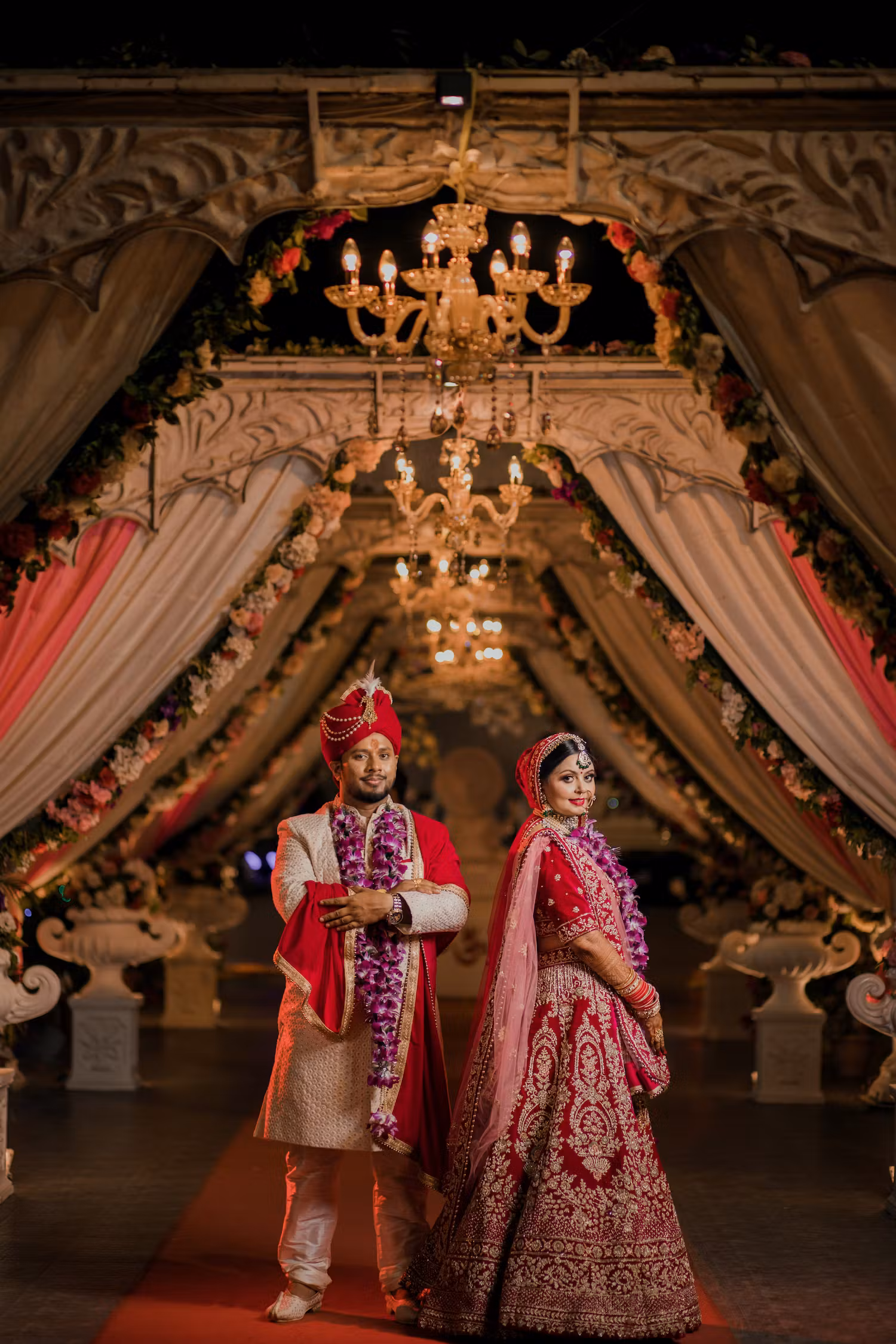 Bride posing with her groom in their wedding pic