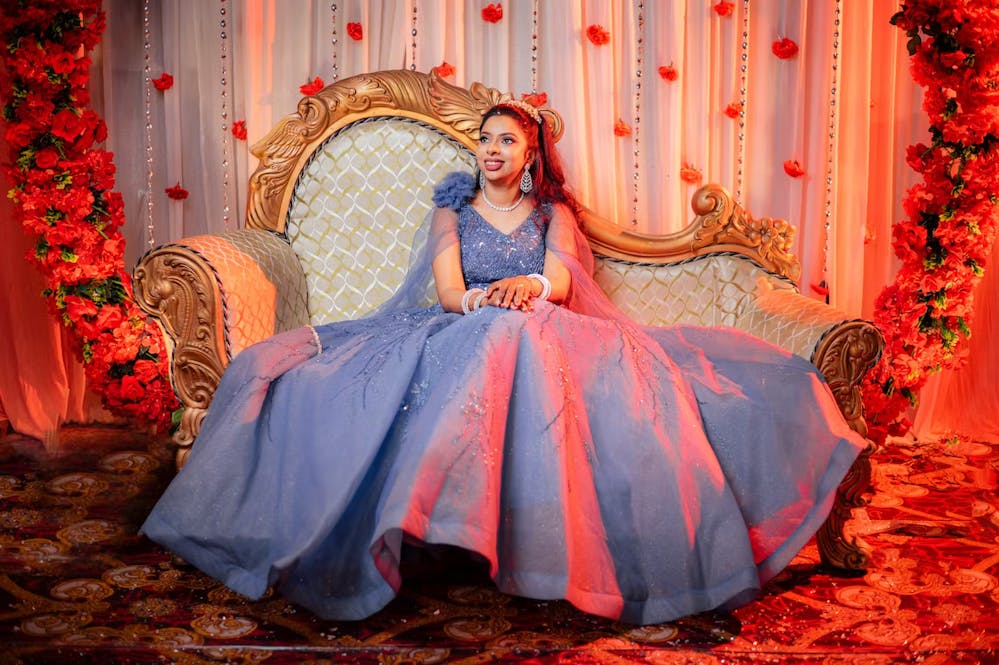 Bride wearing a blue gown pic