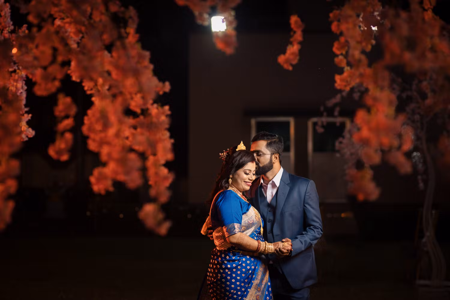 Candid wedding couple forehead kiss pose shot