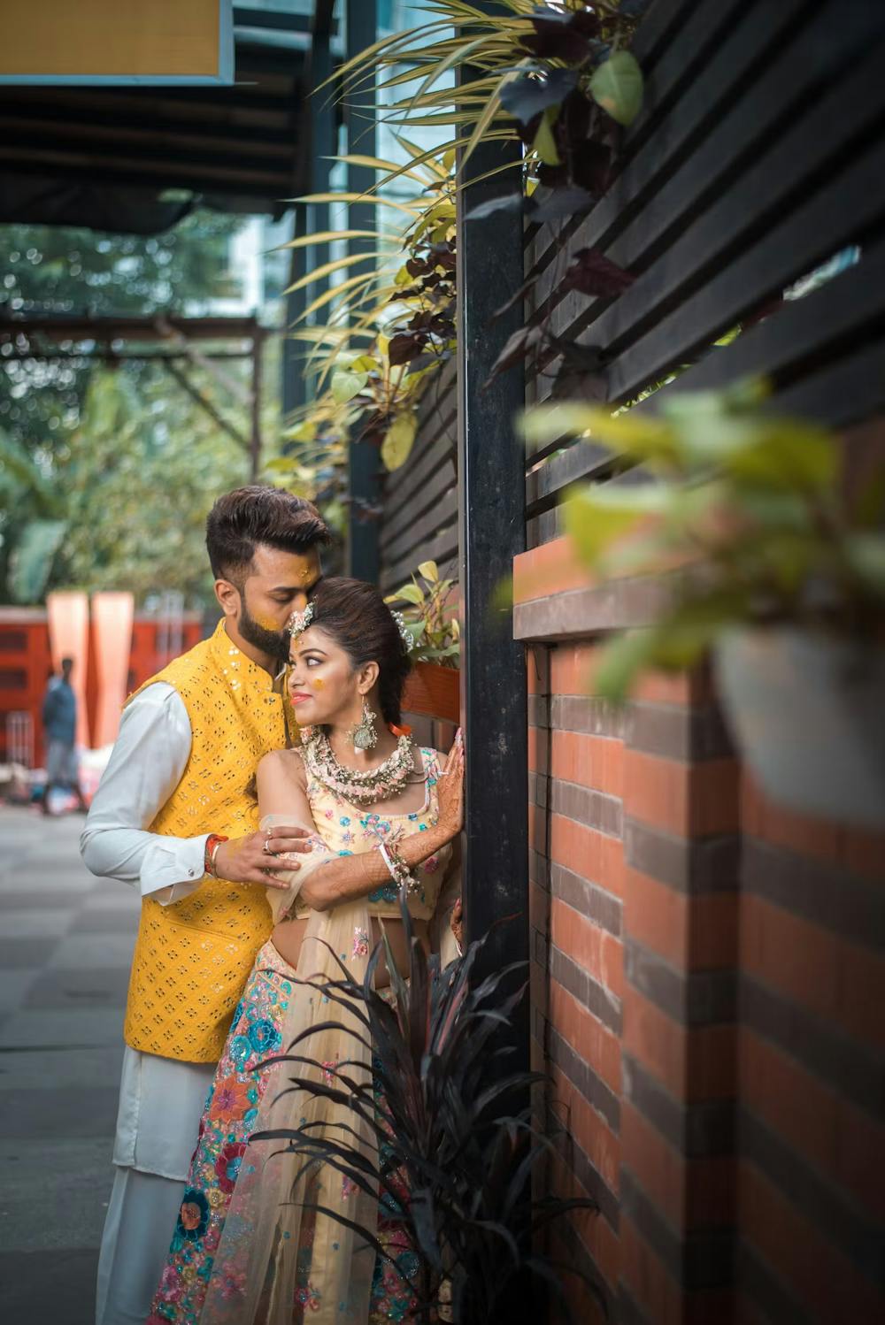 Couple wearing mathing outfit for the Haldi function