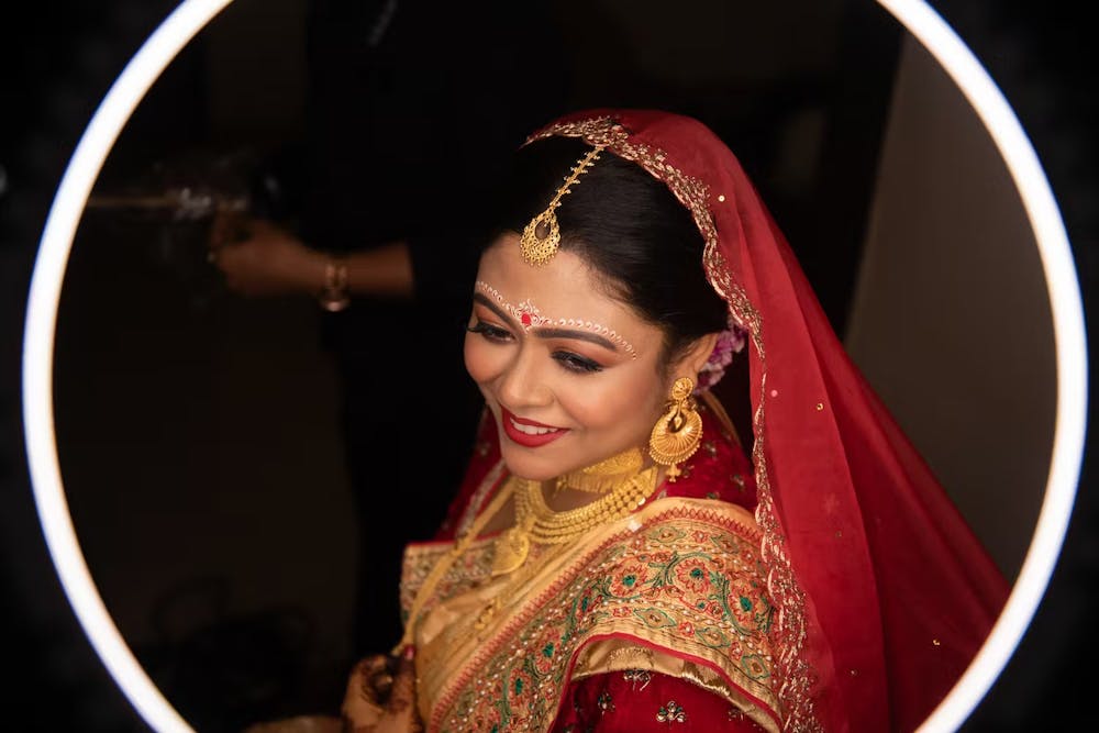 Smiling getting ready pic of wedding bride
