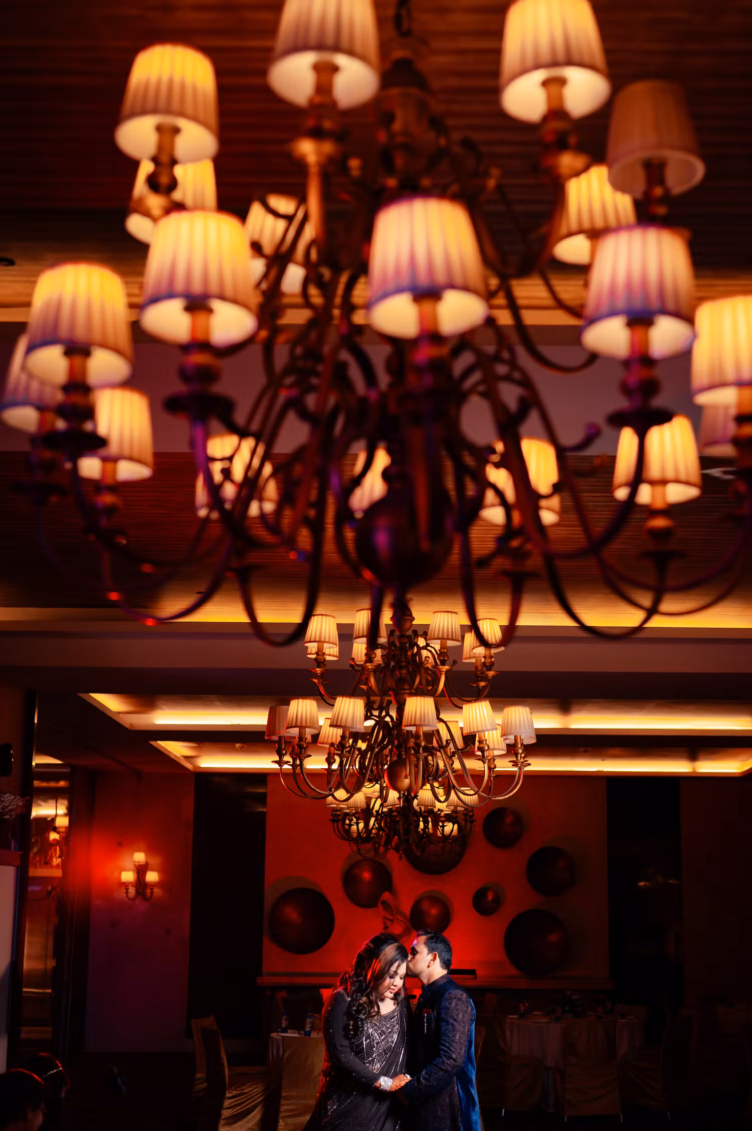 Groom and bride photography in putting focus on decor image