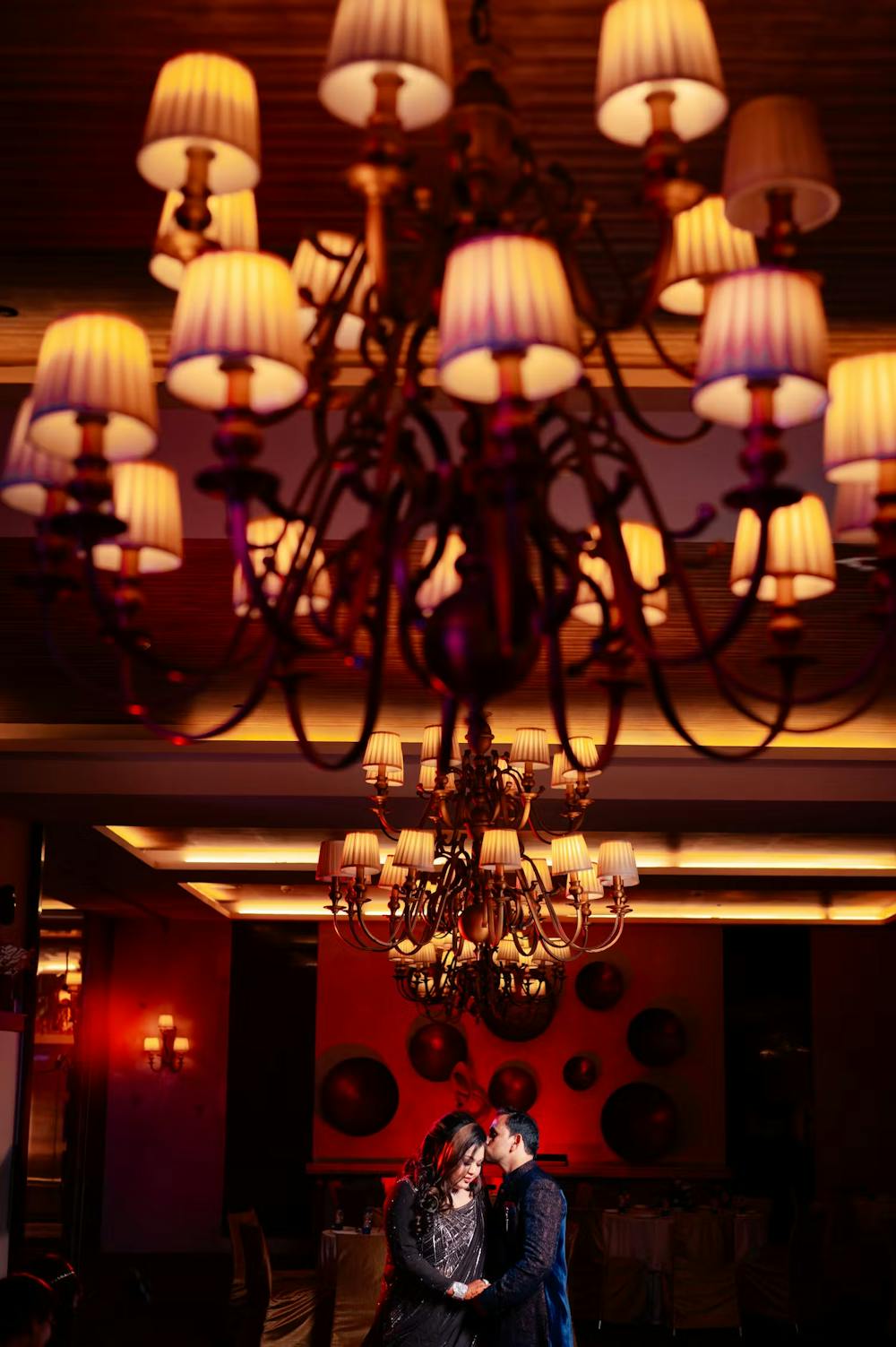 Groom and bride photography in putting focus on decor image