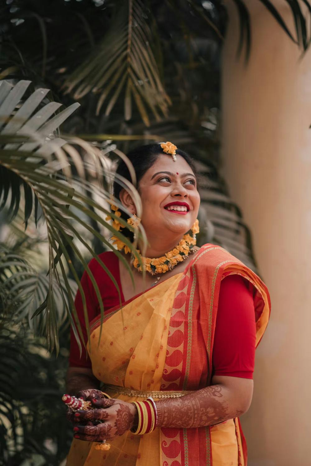 Bride laughing candidly for a wedding photo