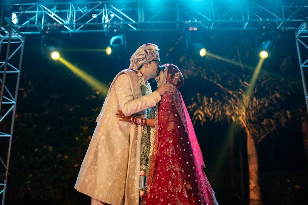 Create Everlasting Memories - Candid Image of Groom Kissing Bride's Forehead