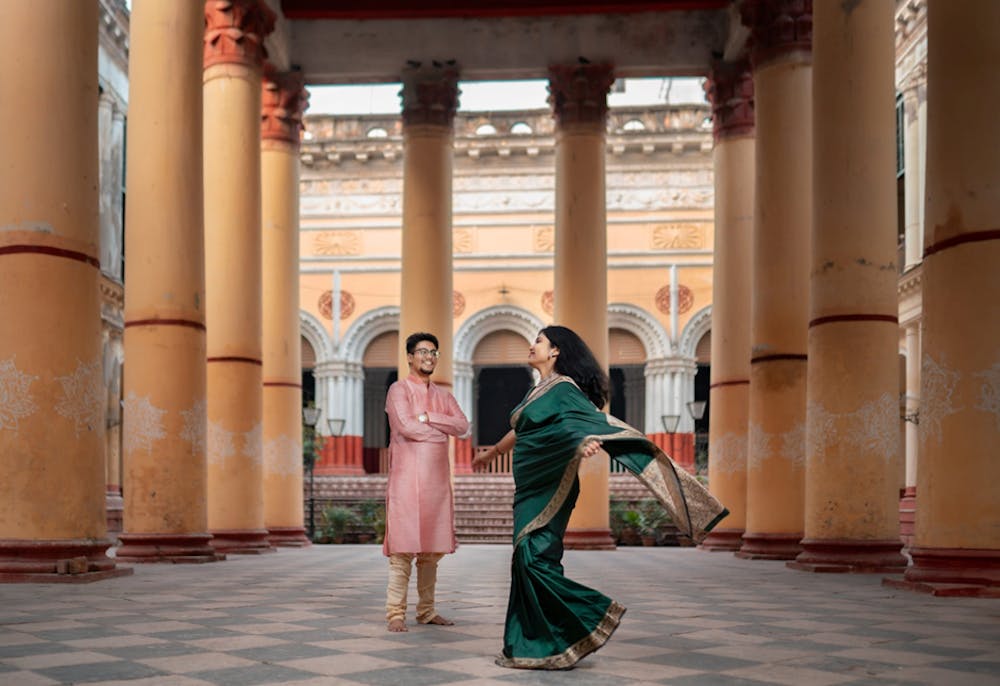Young Bengali Couple at Serampore Rajbari dancing and laughing