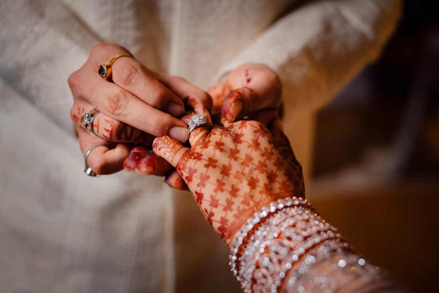 Photoshoot of Bengali man giving his fiancé an traditional engagement ring | Memories Designer