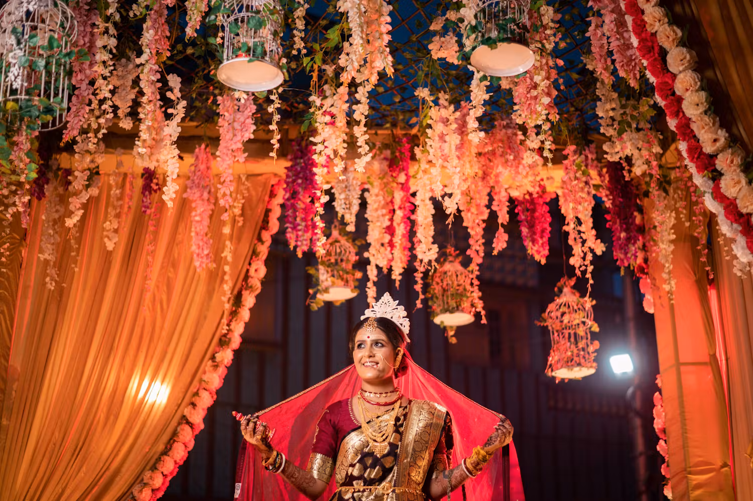 Bengali bride posing near scenic backdrop | Cinematic wedding photoshoot | Memories Designer