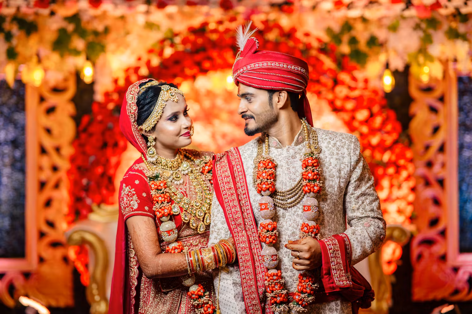 Indian bride and groom look at each other during wedding shoot | Cinematic wedding photoshoot | Memories Designer