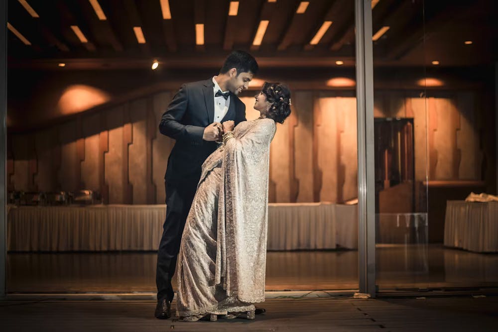 Indian bride and groom dancing | Wedding reception | Memories Designer