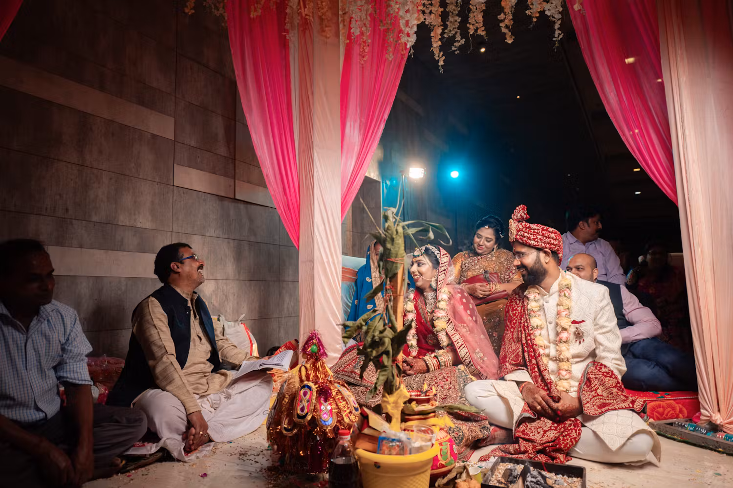 Indian wedding ceremony taking place at wedding venue | Themed wedding photography | Memories Designer