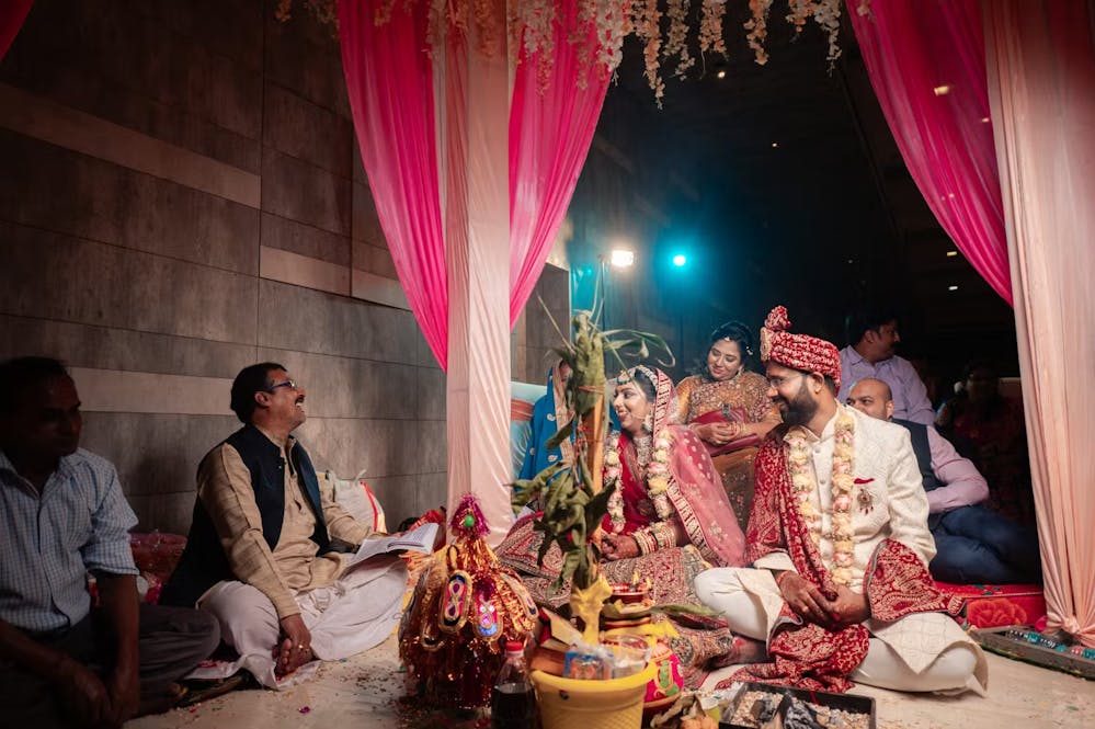 Indian wedding ceremony taking place at wedding venue | Themed wedding photography | Memories Designer