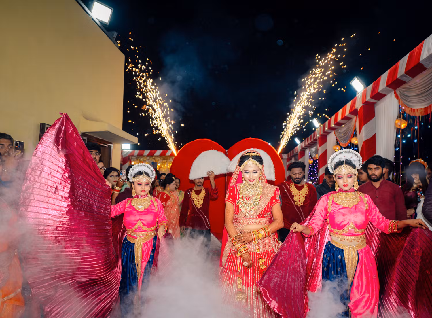 Creative wedding photography ideas for Indian bridal entry with dancers | Memories Designer
