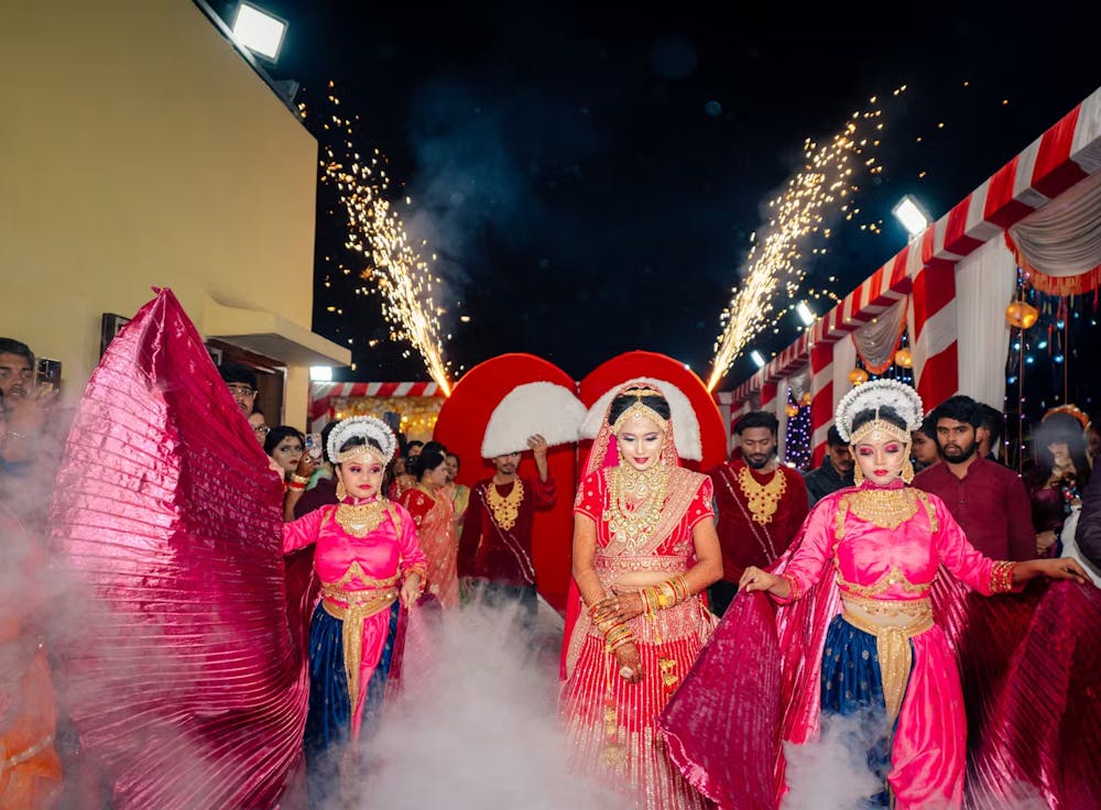 Creative wedding photography ideas for Indian bridal entry with dancers | Memories Designer